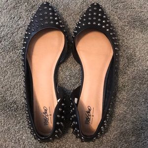 Gently worn studded flats